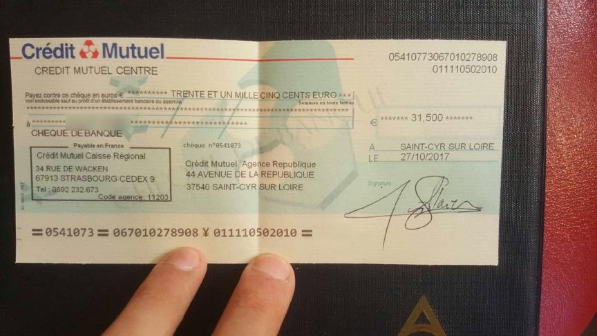 Évitez les arnaques aux faux chèques de banque lors d'un achat auto